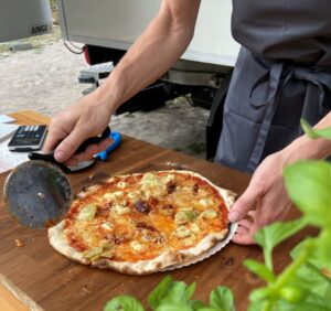Pizza being served